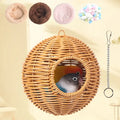 Woven wicker handwoven grass bird cage with heart-shaped entrance housing two colorful parrots by decorbites