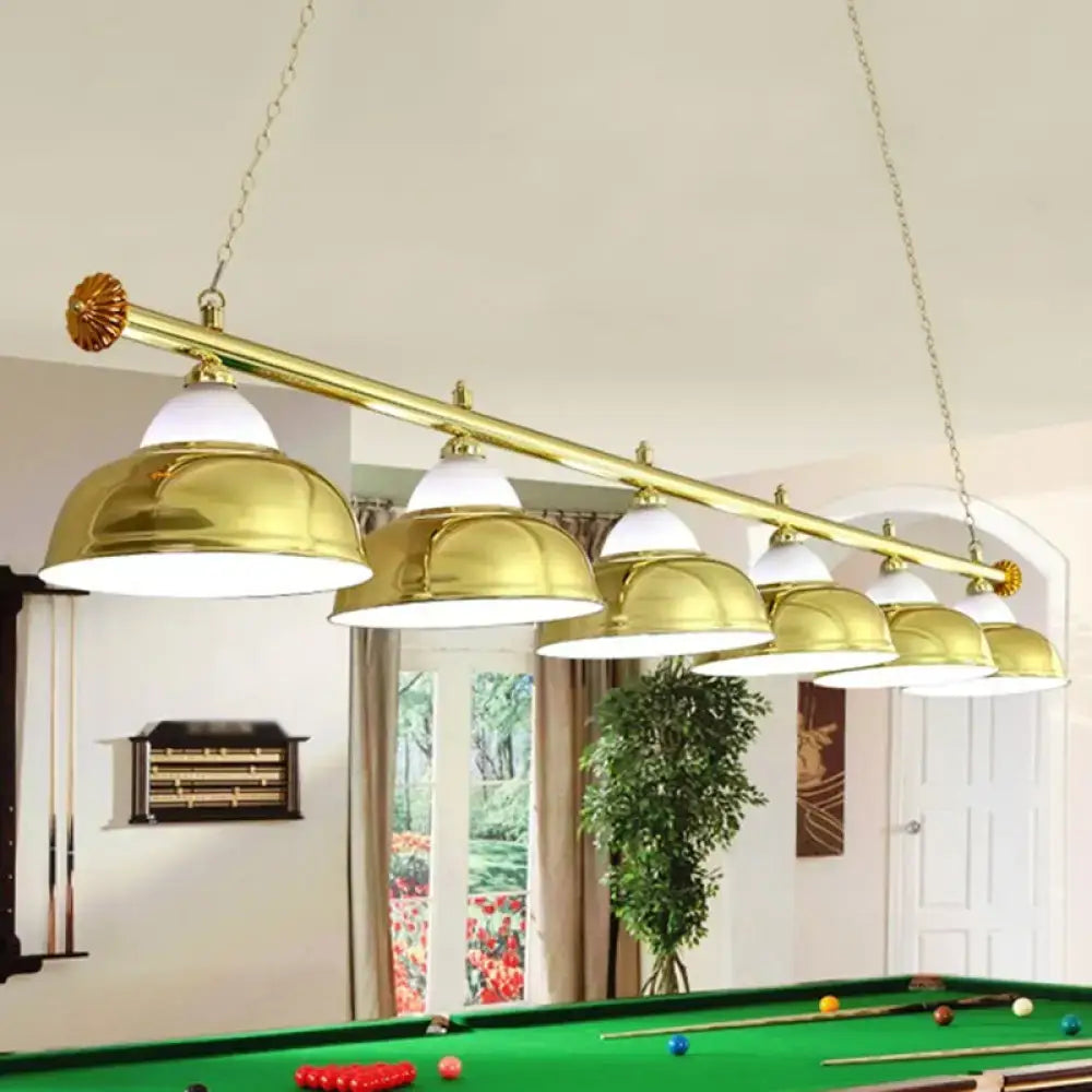 Gold-colored brass metal mirrored bowl suspended lighting fixture with six dome shades for billiard room or island use
