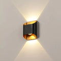 Decorbites™ ip65 modern black and gold led outdoor wall lights with sleek curved design casting warm light beams