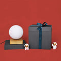 DecorBites™ kids moon sphere maglev table lamp in white plastic with wooden base features LED light type and standard bulb base