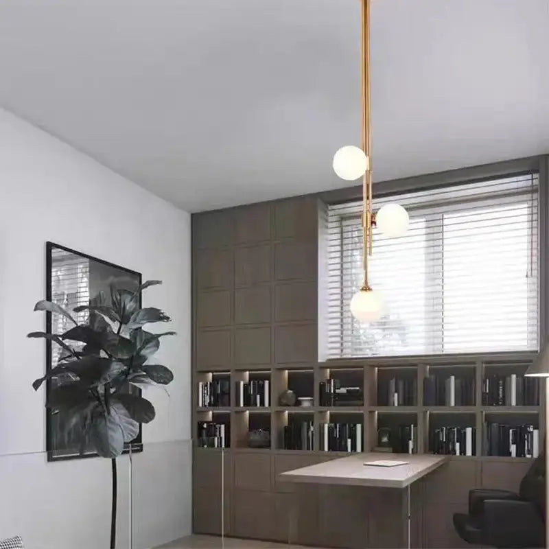 Modern emerald green glass ball pendant light brass dining room