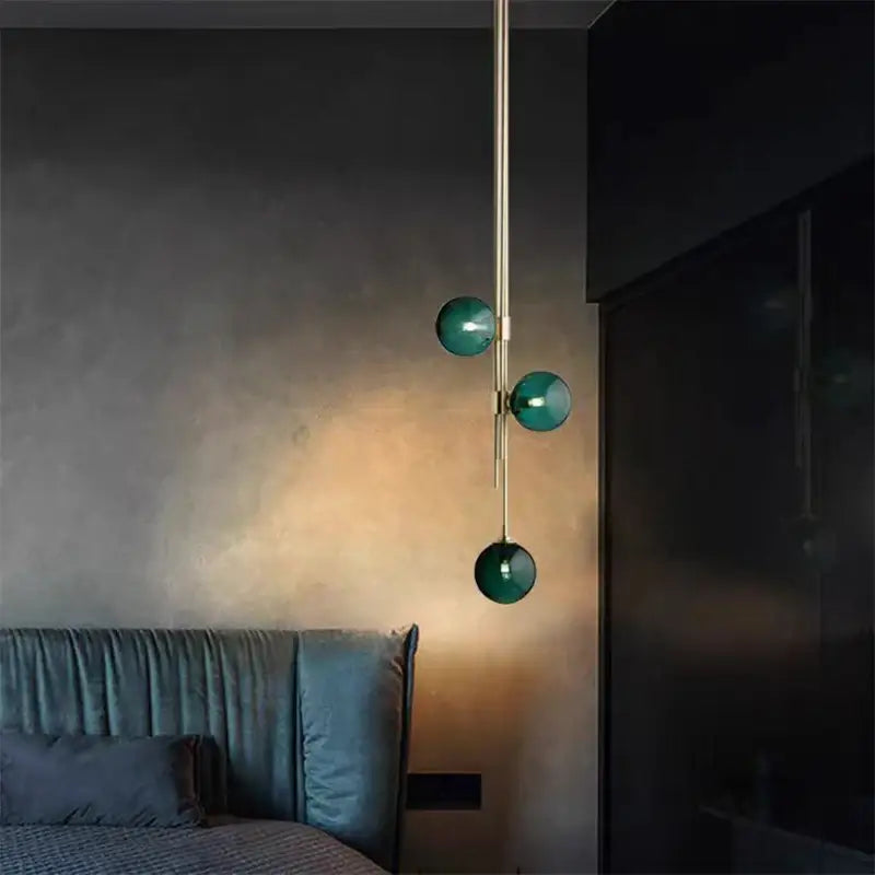 Modern emerald green glass ball pendant light brass dining room