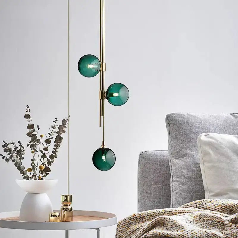 Modern emerald green glass ball pendant light brass dining room