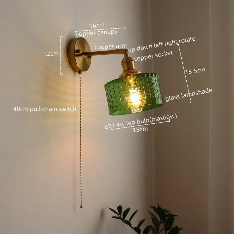 Green ribbed glass wall sconce with pull chain switch for bedroom