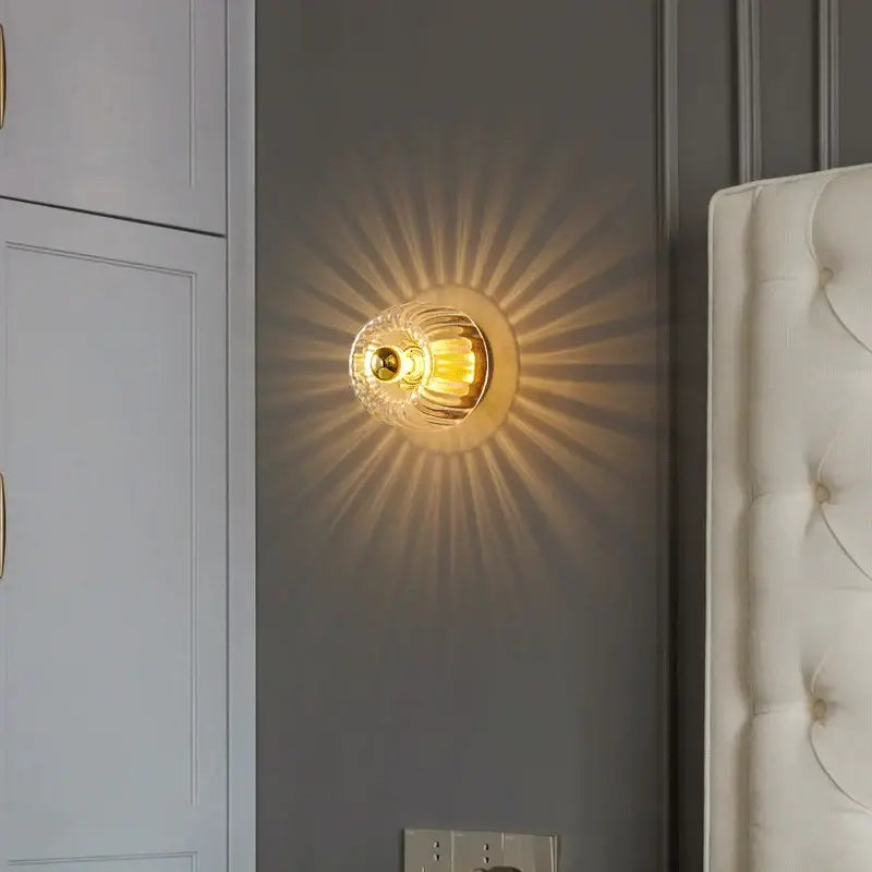 Modern gold and clear faceted led indoor glass wall sconce living room