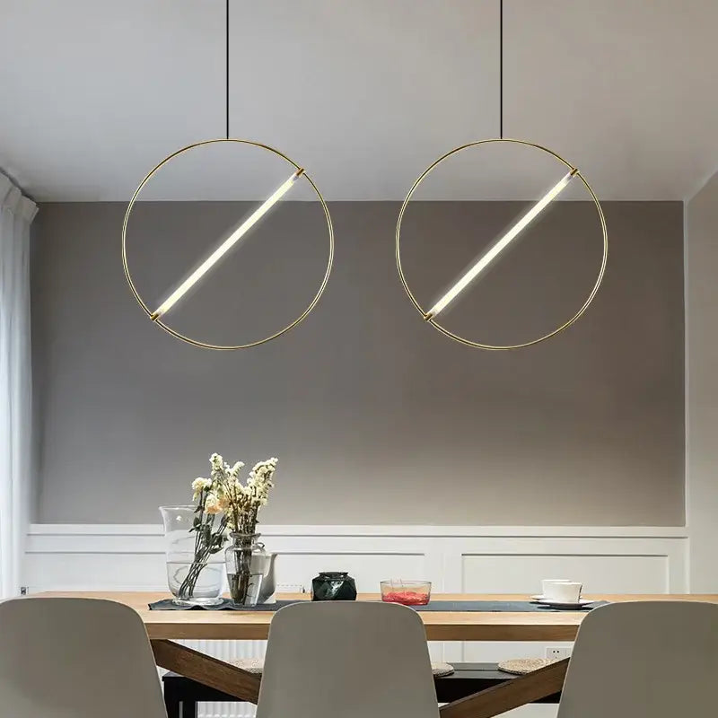 Minimalist gold circular metal pendant light for dining room