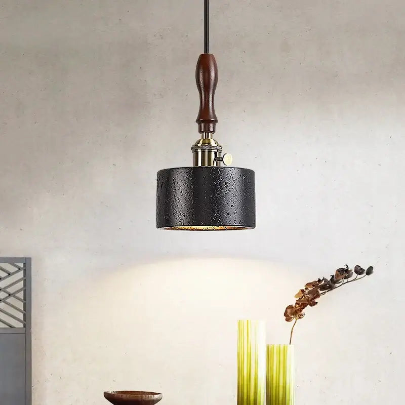 Black travertine cylindrical pendant light for dining room