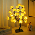 Glowing yellow led rose tree lamp with dark brown branches and black usb powered base for home decor and gifts