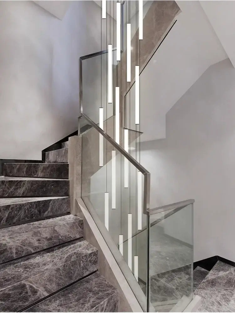 DecorBites™ LED spiral staircase ceiling chandelier with slender rectangular LED tubes in a cascading minimalist design