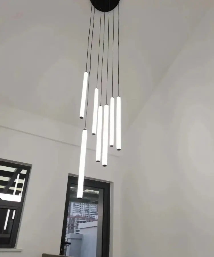 Modern black led spiral staircase chandelier with slender white cylindrical light tubes for home decorbites