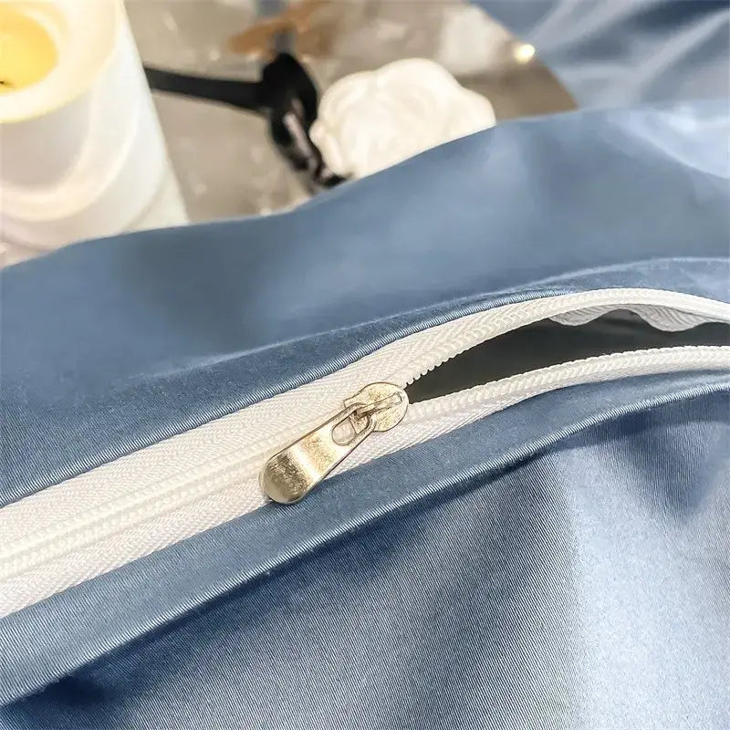 Blue satin duvet cover with white zipper and metallic pull tab from DecorBites™ luxurious 1000TC Egyptian cotton bedding set