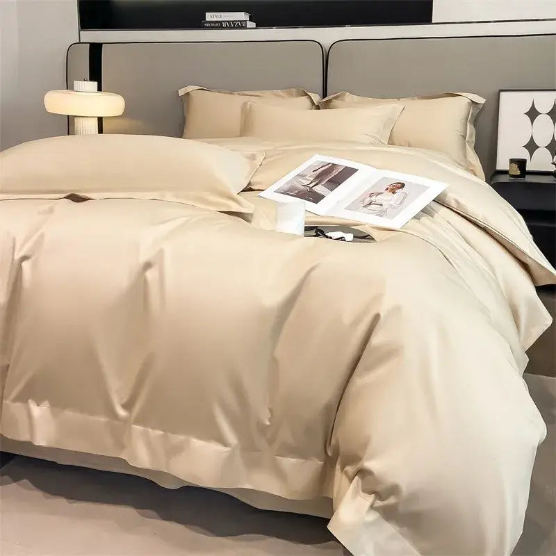 Cream-colored satin duvet cover set with matching pillowcases featuring pleated edges in decorbites™ 1000tc egyptian cotton bedding set