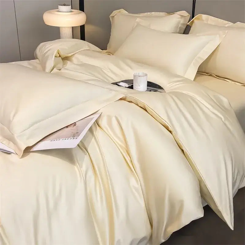 Cream-colored satin duvet cover and fitted sheet with smooth glossy finish in decorbites™ 1000TC Egyptian cotton set
