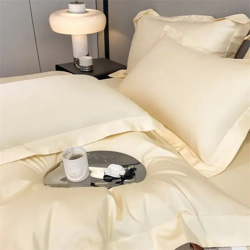 Cream-colored satin decorbites™ luxurious 1000tc egyptian cotton bedding set with smooth duvet cover and elegant stitched edges