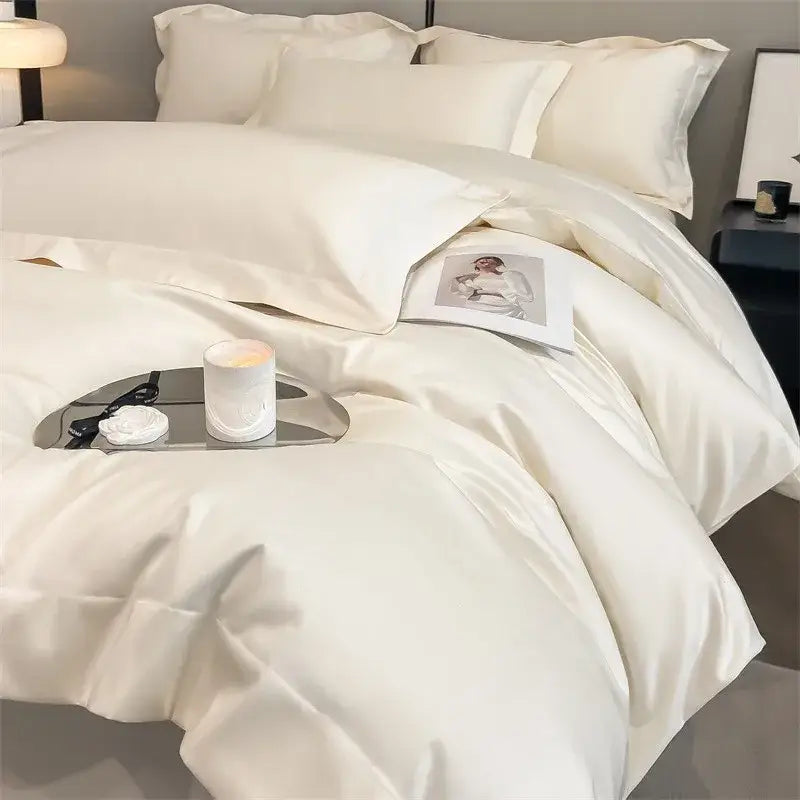Cream-colored decorbites™ luxurious 1000TC egyptian cotton bedding set featuring smooth satin duvet cover and fitted sheet