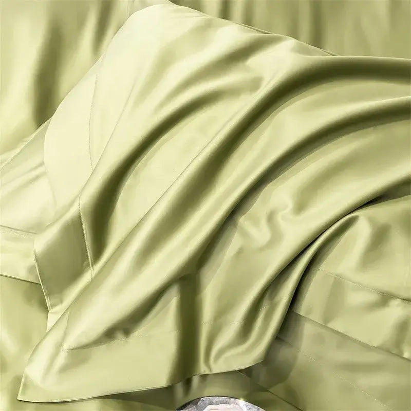 A luxurious sage green satin pillowcase from decorbites 1000tc egyptian cotton bedding set with elegant folds