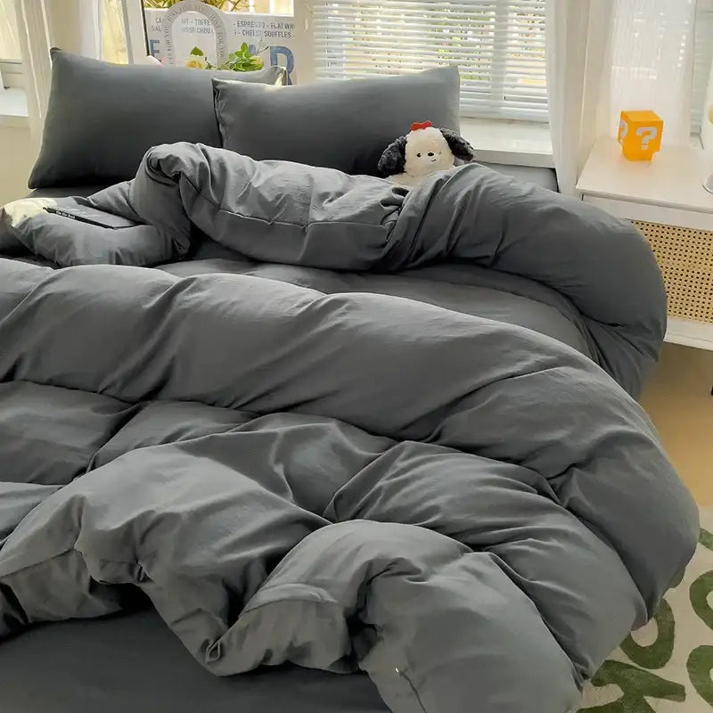 Decorbites™ luxurious 4-piece dark gray cotton bedding set featuring a soft plush quilt with visible stitching lines
