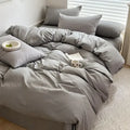 Gray duvet bedding set with matching pillows featuring soft smooth fabric in decorbites™ cotton bedding set