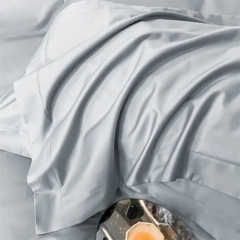 Light gray satin pillowcase with smooth glossy finish and subtle sheen from decorbites™ luxurious 1000tc egyptian cotton bedding set including duvet cover and fitted sheet