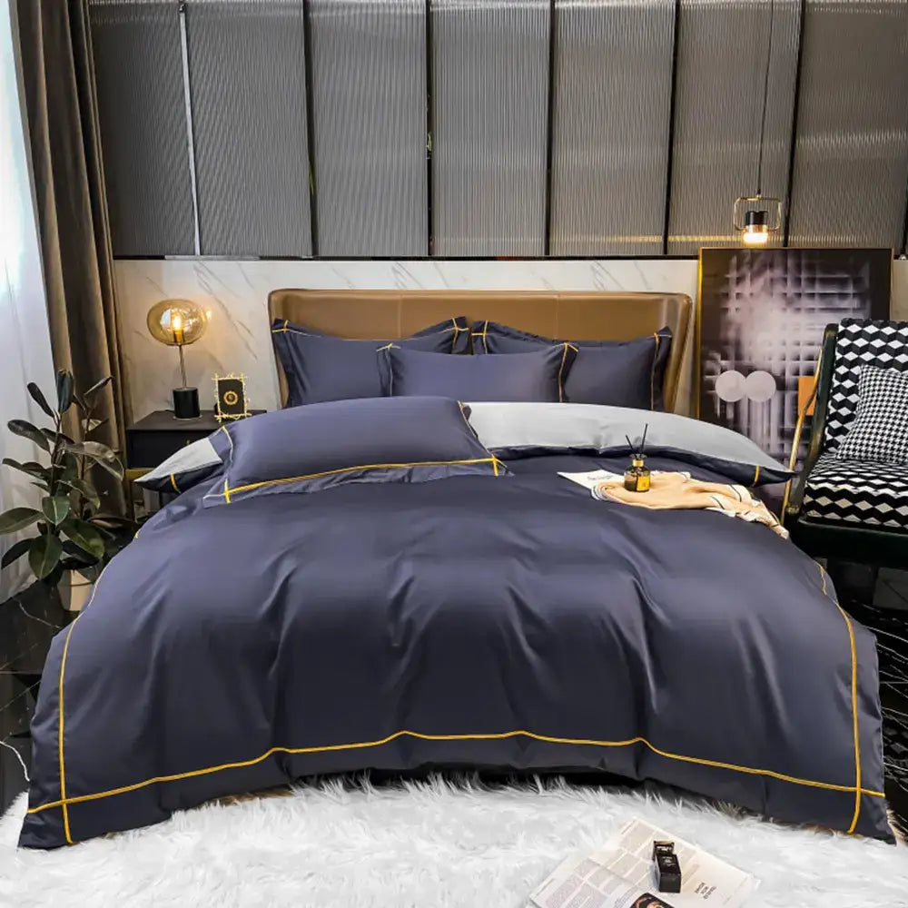 Navy blue satin bedding set with gold piping accents made from luxurious egyptian cotton for duvet cover use