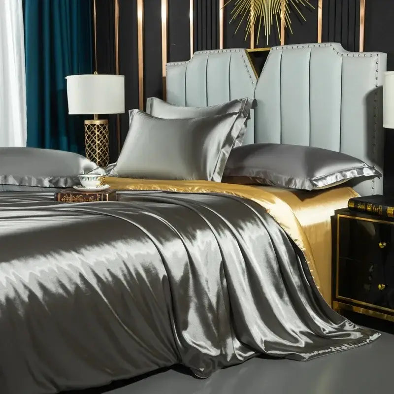 Silver satin pcs duvet cover with glossy finish and elegant folds on a modern bed for width bed by decorbites luxurious nordic silk bedding set