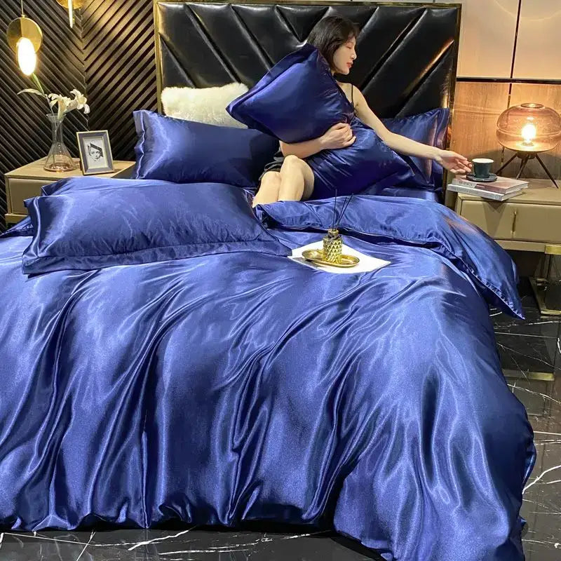 Deep royal blue satin duvet cover from DecorBites™ luxurious rayon silk bedding set for king width bed with glossy finish