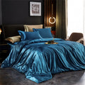 Decorbites luxurious silk bedding set with lustrous teal satin duvet cover and gold-trimmed accent pillows for width bed