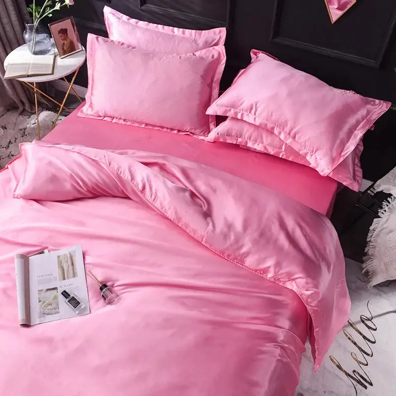 Pink satin silk bedding set with matching pillows and duvet cover from decorbites luxurious silk bedding set range