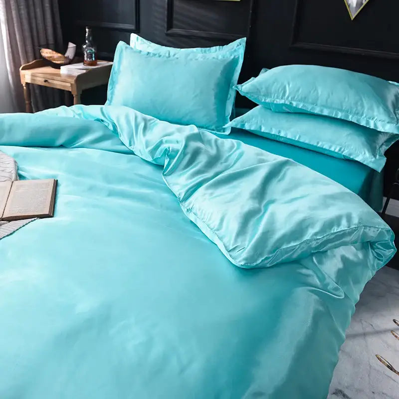 DecorBites™ luxurious silk bedding set in turquoise satin with a smooth glossy finish available in various sizes