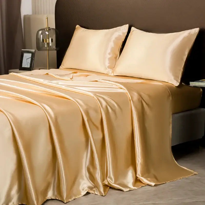 Decorbites™ luxurious solid color bedding set in glossy gold satin with matching flat sheet and pillowcases
