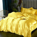 Golden satin DecorBites™ luxurious silk bedding set with plush duvet cover and matching pillows for width bed