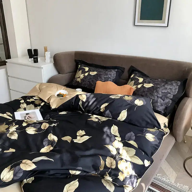 Black satin duvet cover with luxurious gold and gray leaf pattern made of egyptian cotton by DecorBites Luxury Bedding Set