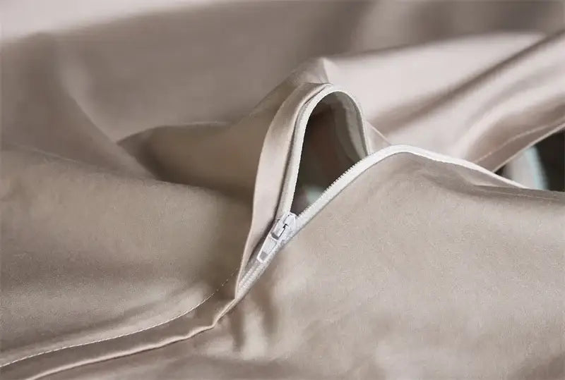 Beige satin duvet cover with subtle sheen and white zipper closure in decorbites luxury egyptian cotton bedding set
