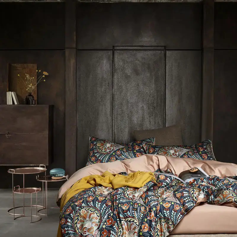 The DecorBites luxury Egyptian cotton duvet cover set features paisley designs in navy rust orange and cream tones