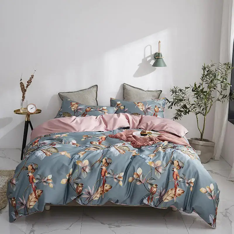 Decorbites luxury flamingo leaf cotton duvet cover with blue floral design and pink satin-like inner lining with pillowcases