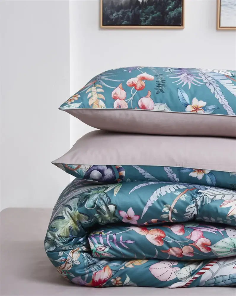 Tealbedding set featuring floral-patterned duvet cover with pink and white blossoms and pieces pillowcases 48 74cm