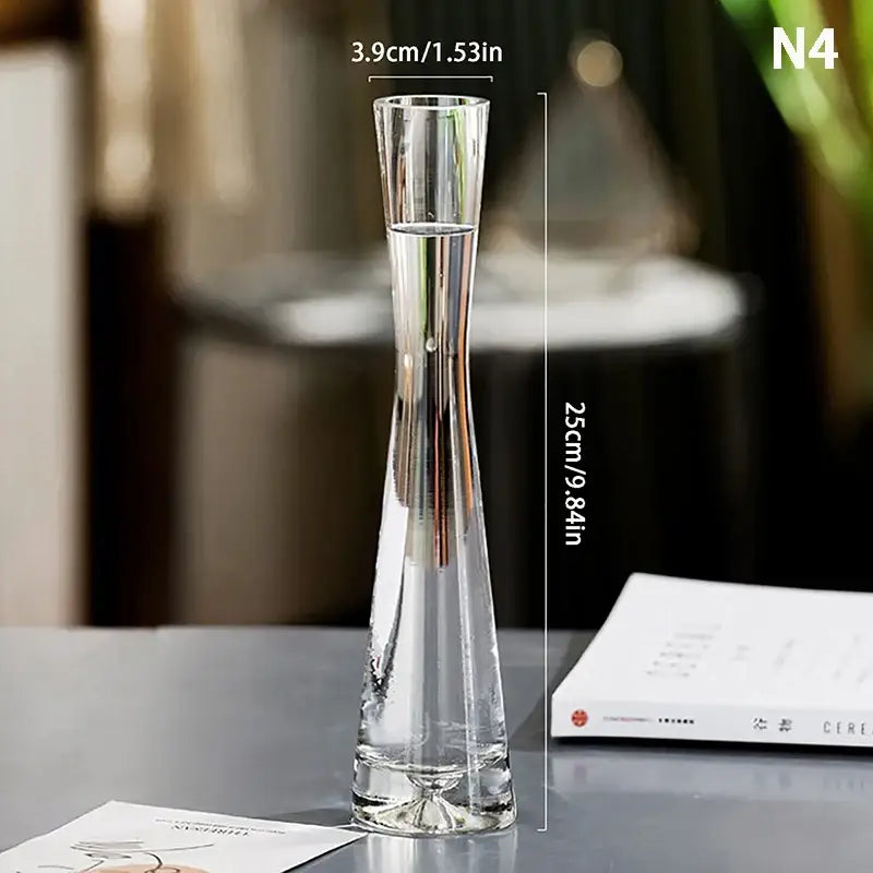 Clear glass flower vase with slender elegant design and flared top by DecorBites for luxury home decor