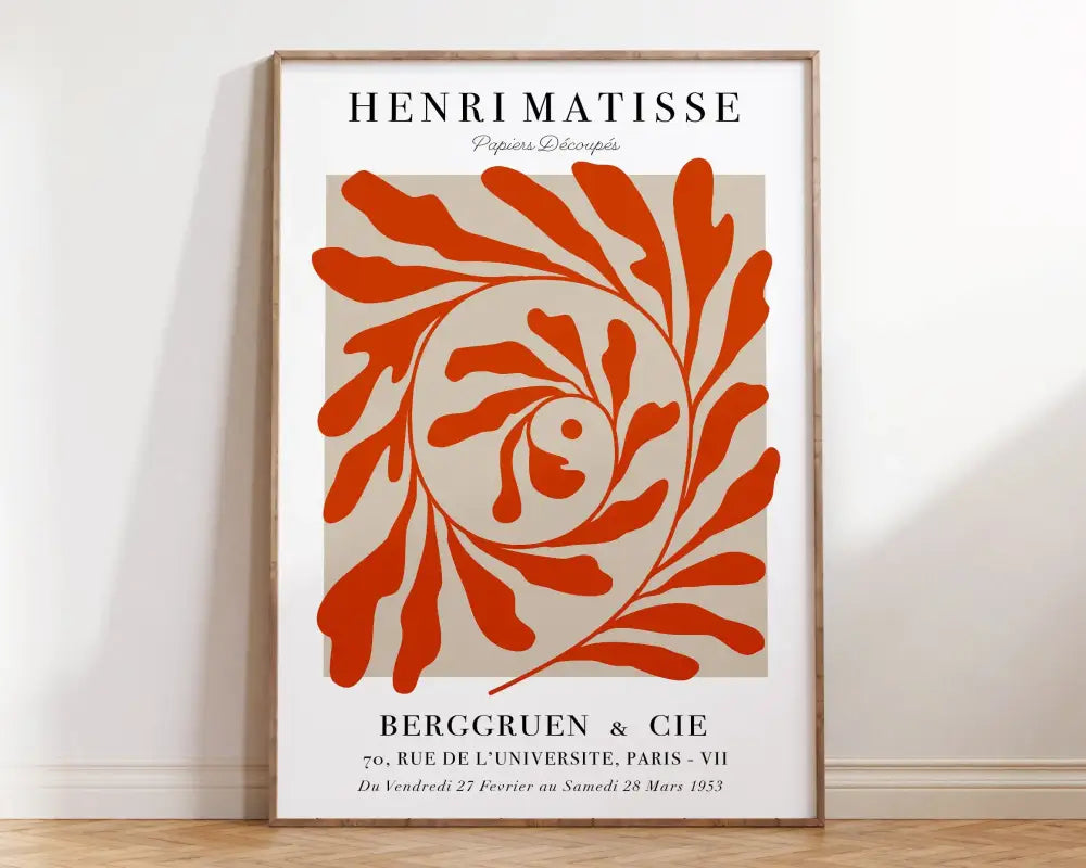 A framed decorbites™ matisse floral art print featuring a bold orange leafy spiral design on a beige background