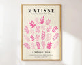 A framed matisse floral art print featuring pink seaweed illustrations on cream background for elegant decor