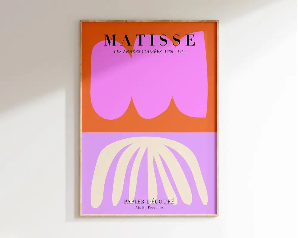 A framed decorbites™ matisse floral art print featuring bold botanical cut paper in vibrant orange and lavender hues