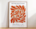 A framed DecorBites™ matisse floral art print with a bold orange leafy spiral on beige background floral art prints