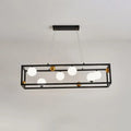 Black rectangular metal pendant light with gold accents and milk glass shade for industrial dining rooms