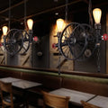 Industrial-style black wrought iron metallic pendant light with vintage bicycle wheels and antique 3-head wagon wheel design compatible with 220v-240v and 110v-120v