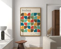 A DecorBites mid century canvas print featuring colorful geometric semicircles in red orange teal and olive green