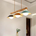 Modern three-light pendant lamp by decorbites with wooden beam and e26 bulb base in blue grey and yellow tones