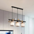 DecorBites™ modern black cylinder island light pendant features three crystal glass shades with white bird accents
