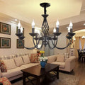 Decorbites™ modern black iron chandelier with ornate scrollwork and six candle-style bulbs for living room