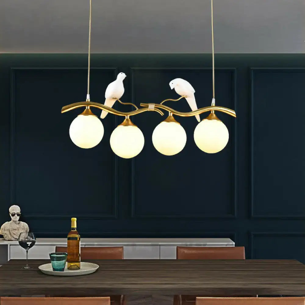 DecorBites™ Modern Branch Island Pendant Light with Ball Glass Shade and Bird Deco - Metal 4-Light Fixture for Dining Room