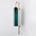 Decorbites modern brass wall sconce with a tall pine green glass shade on slender brass rods and arched top