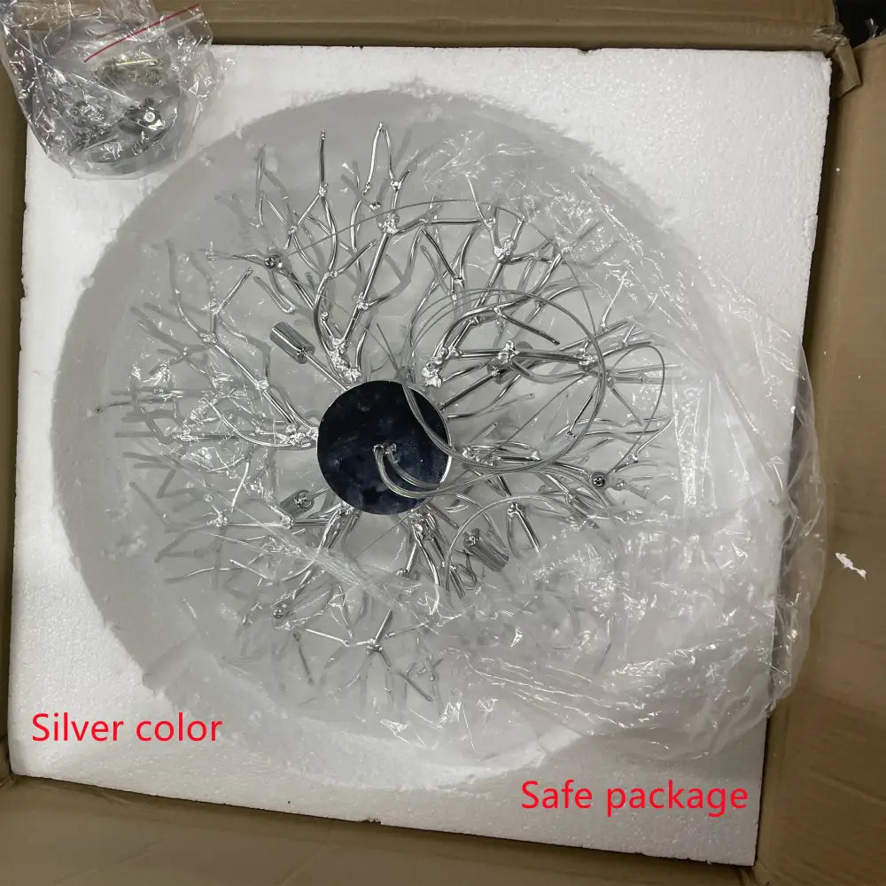 DecorBites™ modern chrome chandelier with silver branch-style design and dark base featuring chrome rectangular crystals lamp package